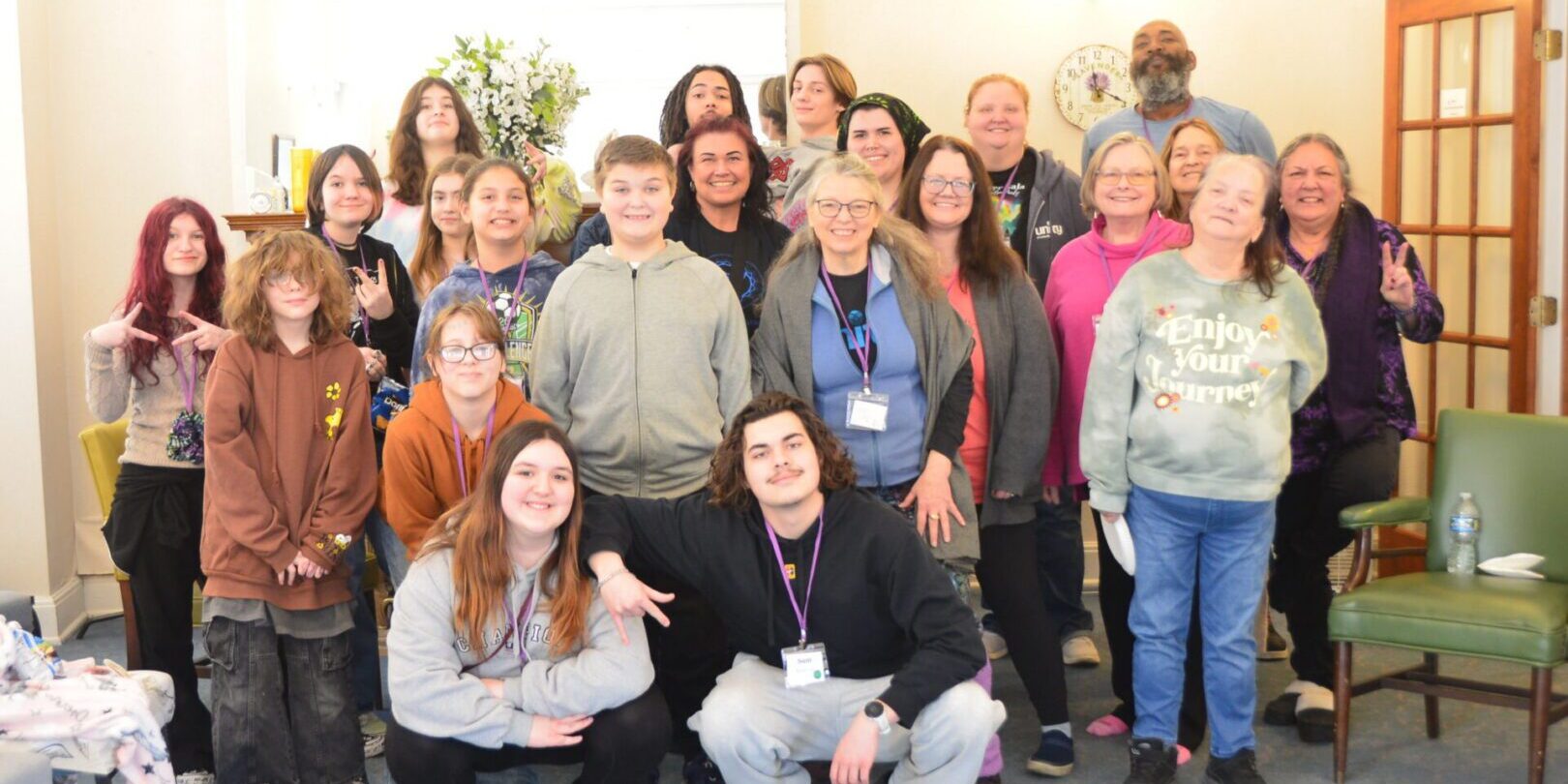 Group photo of smiling individuals together.